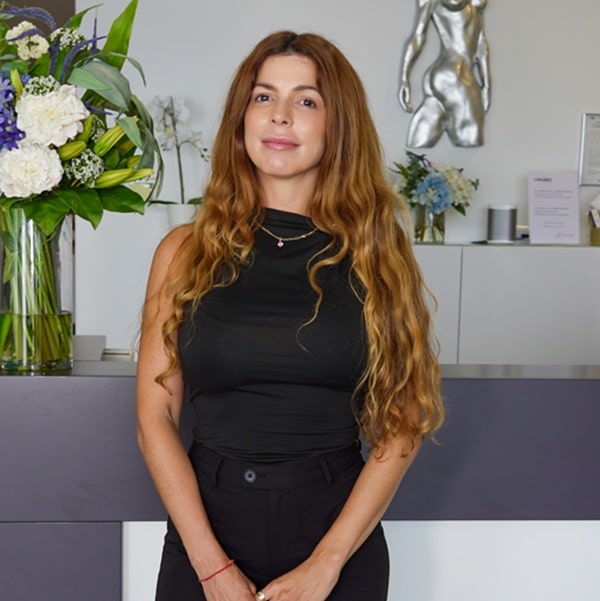 Patient at the reception of Cirumed Clinic in Marbella, Spain, ready for cosmetic surgery consultations.